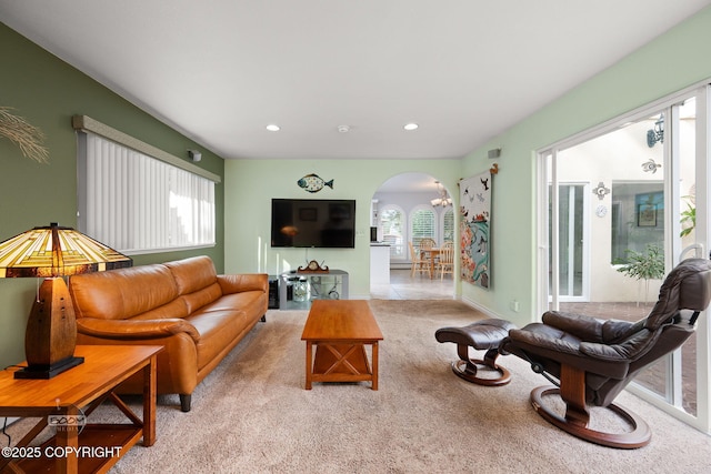 14121 Sunview Dr, Anchorage, AK 99515 - carpeted living room with arched walkways and recessed lighting