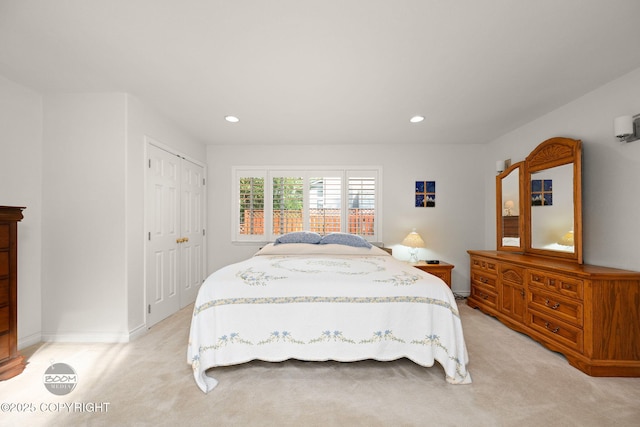 14121 Sunview Dr, Anchorage, AK 99515 - bedroom with light colored carpet, a closet, and recessed lighting