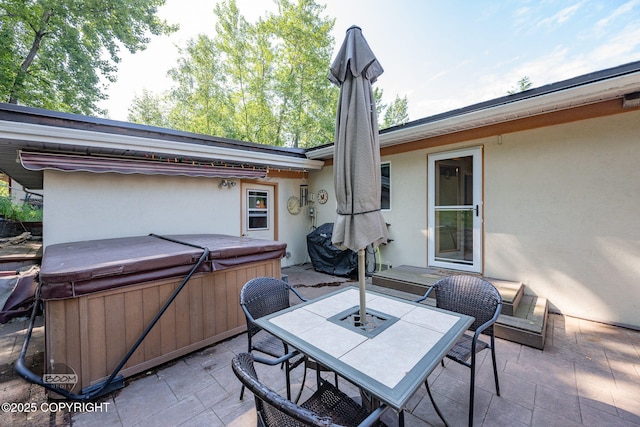 14121 Sunview Dr, Anchorage, AK 99515 - view of patio / terrace featuring a hot tub, outdoor dining area, and area for grilling