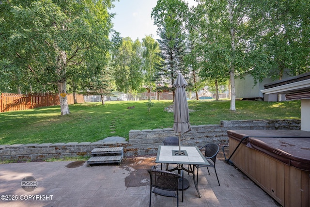 14121 Sunview Dr, Anchorage, AK 99515 - view of patio / terrace featuring a hot tub and outdoor dining area