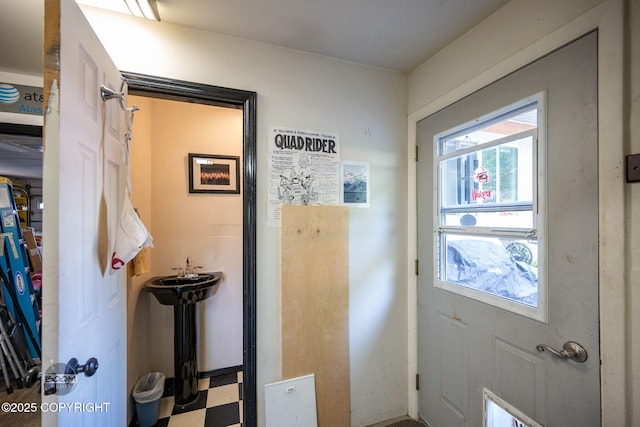 14121 Sunview Dr, Anchorage, AK 99515 - doorway with healthy amount of natural light and tile patterned floors