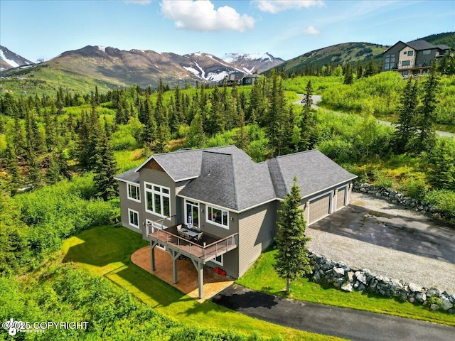 16071 Mountain Air Dr, Anchorage, AK 99516 - aerial view of property and surrounding area with a mountain backdrop