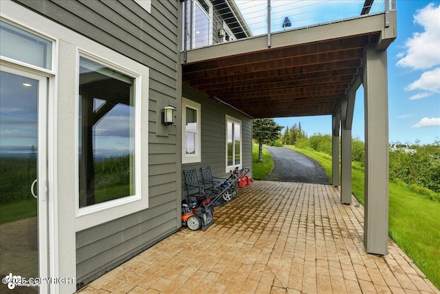 16071 Mountain Air Dr, Anchorage, AK 99516 - view of patio / terrace featuring driveway