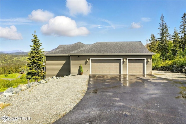 16071 Mountain Air Dr, Anchorage, AK 99516 - view of front of property with a garage and driveway