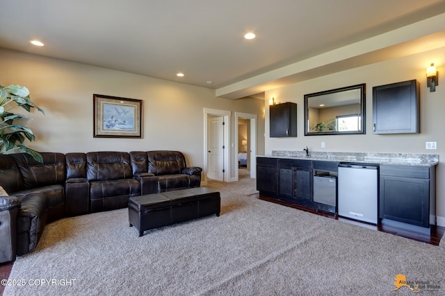 16071 Mountain Air Dr, Anchorage, AK 99516 - carpeted living area with bar with sink and recessed lighting