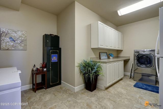 16071 Mountain Air Dr, Anchorage, AK 99516 - laundry room with washer and dryer and cabinet space