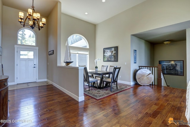 16071 Mountain Air Dr, Anchorage, AK 99516 - foyer featuring a high ceiling, healthy amount of natural light, a chandelier, wood-type flooring, and recessed lighting