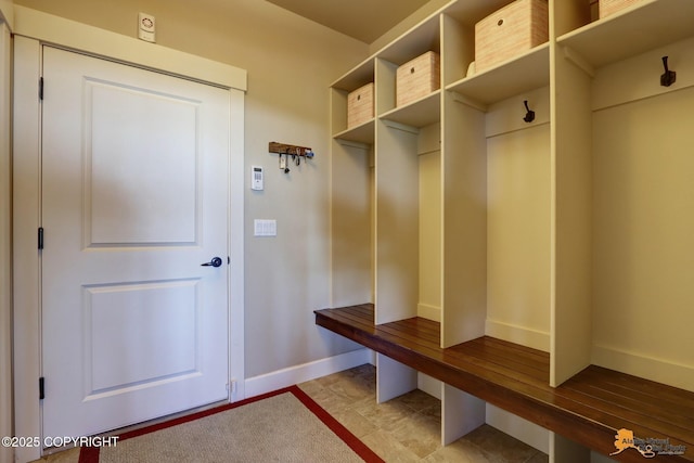 16071 Mountain Air Dr, Anchorage, AK 99516 - mudroom with baseboards