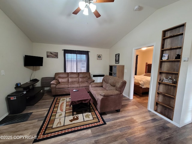 46210 Bonita Ave, Soldotna, AK 99669 - living area with a ceiling fan, wood finished floors, and lofted ceiling