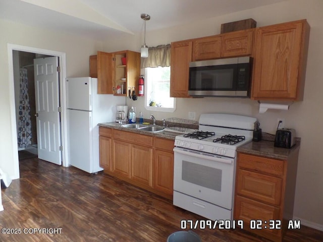 46210 Bonita Ave, Soldotna, AK 99669 - kitchen with white appliances, dark wood-type flooring, vaulted ceiling, hanging light fixtures, and open shelves