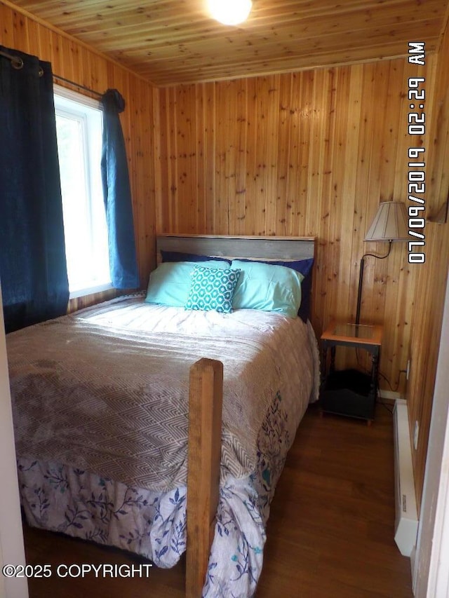 46210 Bonita Ave, Soldotna, AK 99669 - bedroom featuring wooden walls, wood finished floors, and wood ceiling