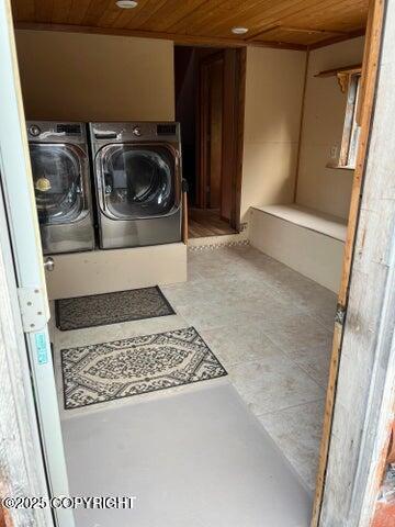 53245 Coyote Ln, Nikiski/North Kenai, AK 99611 - laundry area with wooden ceiling and washing machine and clothes dryer