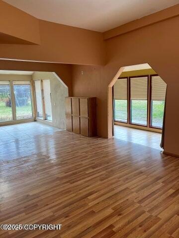 53245 Coyote Ln, Nikiski/North Kenai, AK 99611 - unfurnished living room with wood finished floors