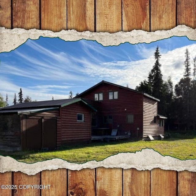 53245 Coyote Ln, Nikiski/North Kenai, AK 99611 - view of side of property with log veneer siding and a yard