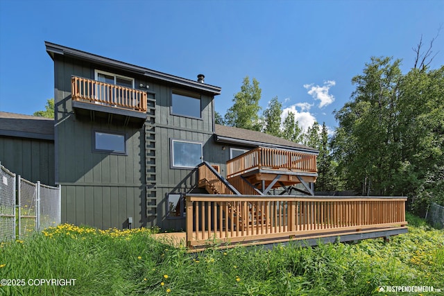 19712 Chugach Park Dr, Eagle River, AK 99567 - back of property featuring a deck and stairs