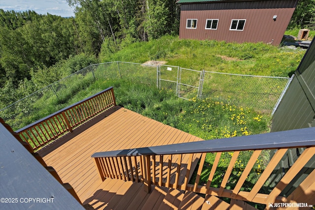 19712 Chugach Park Dr, Eagle River, AK 99567 - wooden deck featuring a forest view