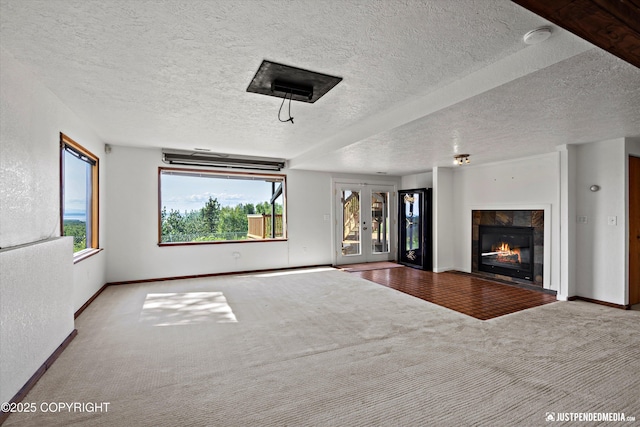 19712 Chugach Park Dr, Eagle River, AK 99567 - unfurnished living room featuring carpet floors, a tile fireplace, and a textured ceiling