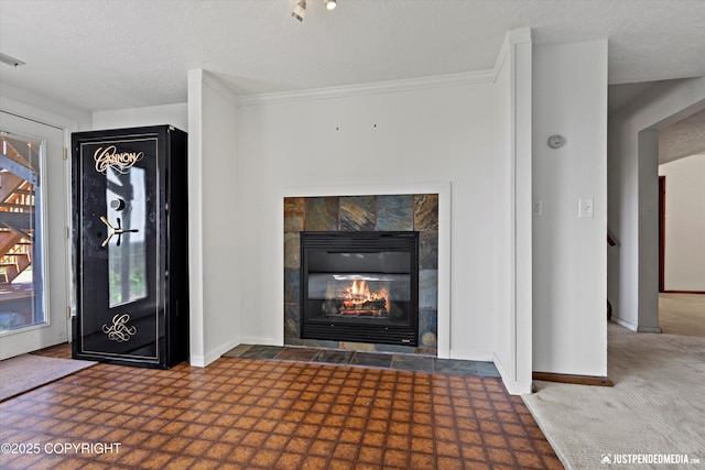19712 Chugach Park Dr, Eagle River, AK 99567 - foyer featuring a tile fireplace and a textured ceiling
