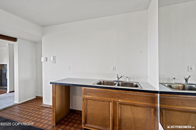 19712 Chugach Park Dr, Eagle River, AK 99567 - kitchen with brown cabinetry and dark floors