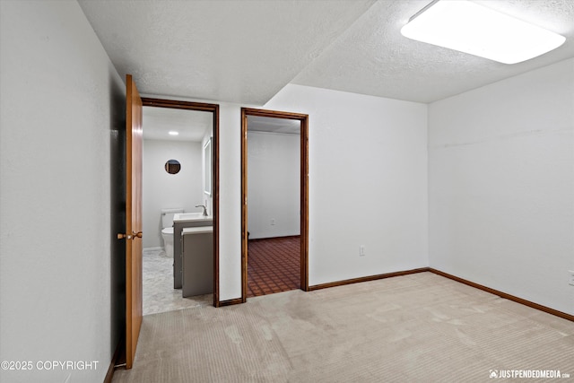 19712 Chugach Park Dr, Eagle River, AK 99567 - unfurnished bedroom with carpet floors and a textured ceiling