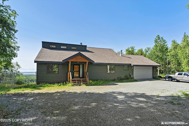 19712 Chugach Park Dr, Eagle River, AK 99567 - modern home with roof with shingles, gravel driveway, and a garage