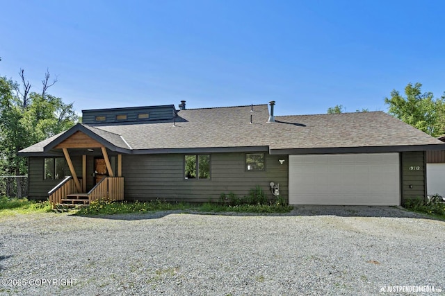 19712 Chugach Park Dr, Eagle River, AK 99567 - view of front of house featuring a shingled roof, a garage, and gravel driveway