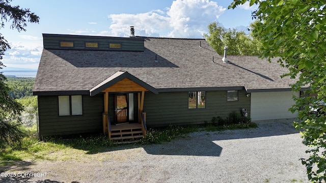 19712 Chugach Park Dr, Eagle River, AK 99567 - view of front of house with a shingled roof, driveway, and a garage