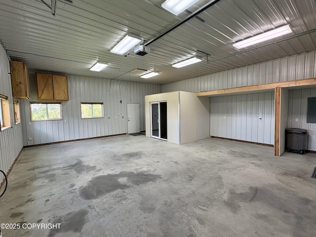 19712 Chugach Park Dr, Eagle River, AK 99567 - garage with a garage door opener and a wood stove