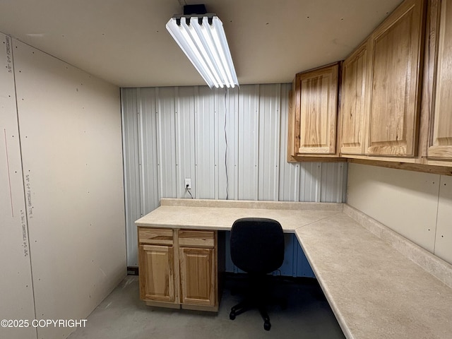 19712 Chugach Park Dr, Eagle River, AK 99567 - home office with built in study area and concrete flooring