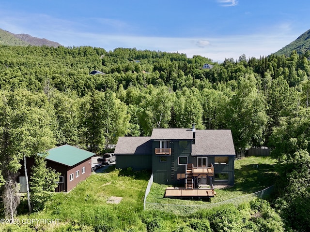 19712 Chugach Park Dr, Eagle River, AK 99567 - view from above of property featuring a forest and a mountainous background