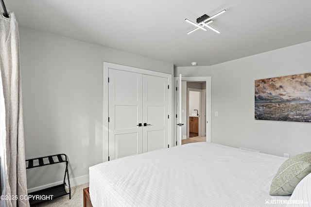 9203 Strutz Ave, Anchorage, AK 99507 - bedroom featuring a closet and carpet flooring