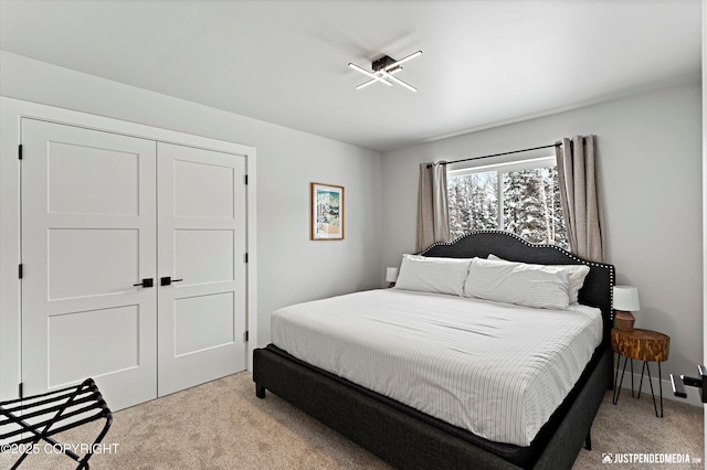 9203 Strutz Ave, Anchorage, AK 99507 - bedroom with light colored carpet and a closet