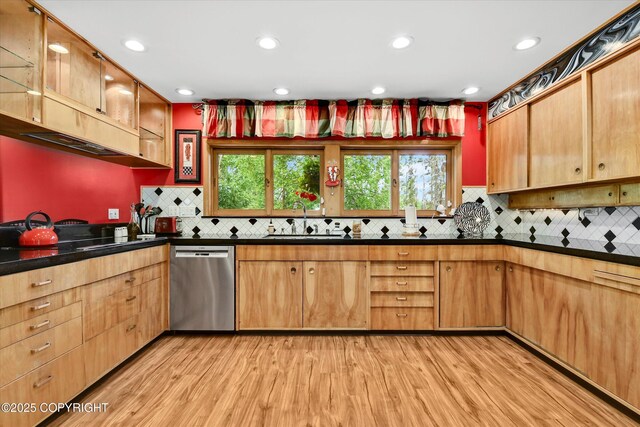 3890 Janet Lee Cir, Anchorage, AK 99516 - kitchen with stainless steel dishwasher, light wood finished floors, dark countertops, tasteful backsplash, and recessed lighting