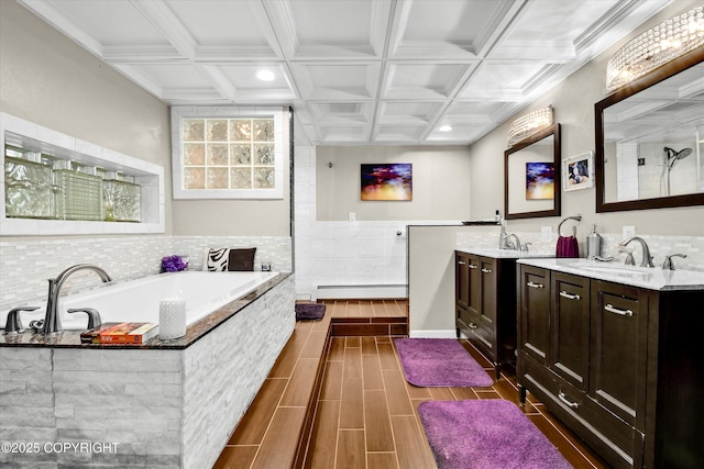 3890 Janet Lee Cir, Anchorage, AK 99516 - full bathroom featuring baseboard heating, two vanities, a garden tub, coffered ceiling, and beam ceiling