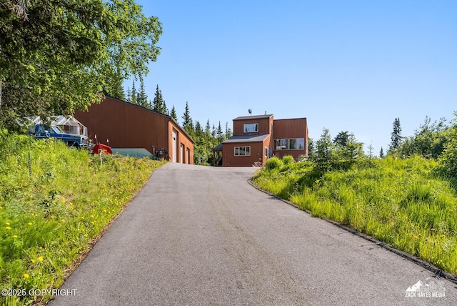 11411 Snowline Dr, Anchorage, AK 99507 - view of front of home with a garage