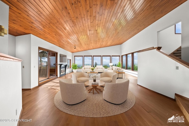 11411 Snowline Dr, Anchorage, AK 99507 - sitting room with wooden ceiling, vaulted ceiling, stairs, and wood finished floors