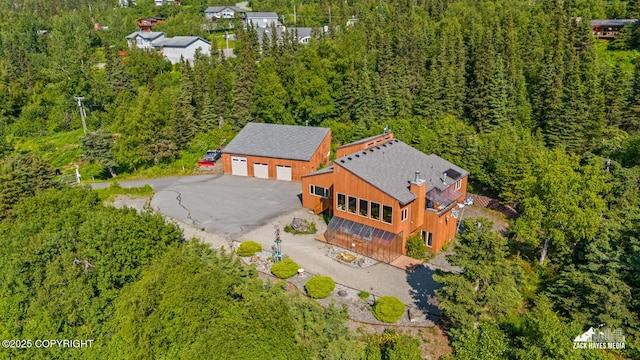 11411 Snowline Dr, Anchorage, AK 99507 - aerial view of property and surrounding area with a heavily wooded area