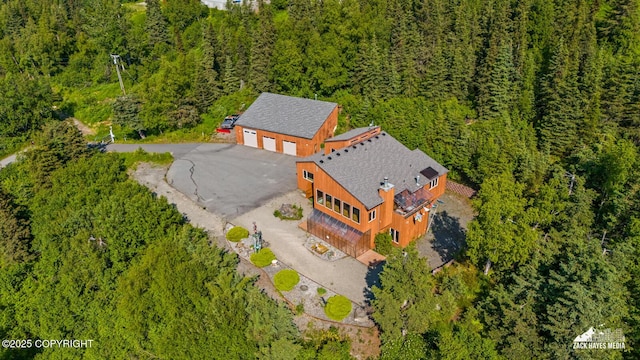 11411 Snowline Dr, Anchorage, AK 99507 - aerial view of property and surrounding area with a heavily wooded area