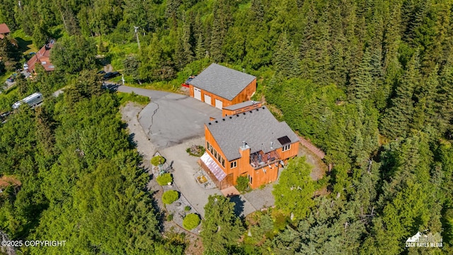 11411 Snowline Dr, Anchorage, AK 99507 - aerial view of property and surrounding area featuring a heavily wooded area
