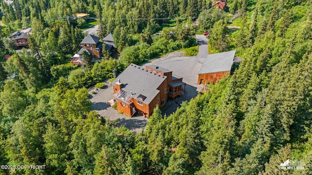 11411 Snowline Dr, Anchorage, AK 99507 - view of subject property with a forest