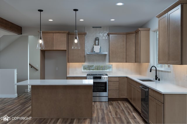 17939 Yellowstone Dr, Eagle River, AK 99577 - kitchen with appliances with stainless steel finishes, wood finished floors, backsplash, recessed lighting, and a center island