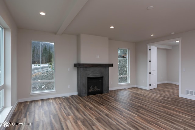 17939 Yellowstone Dr, Eagle River, AK 99577 - unfurnished living room with wood finished floors, recessed lighting, a fireplace, and beam ceiling