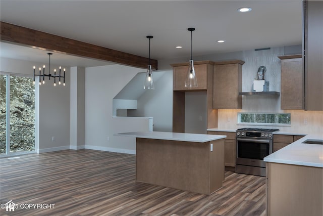 17939 Yellowstone Dr, Eagle River, AK 99577 - kitchen featuring stainless steel gas range oven, wood finished floors, recessed lighting, tasteful backsplash, and light countertops