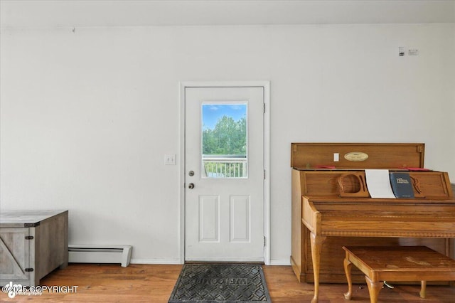 1447 N Ranch Rd, Palmer, AK 99645 - entryway with baseboard heating and wood finished floors
