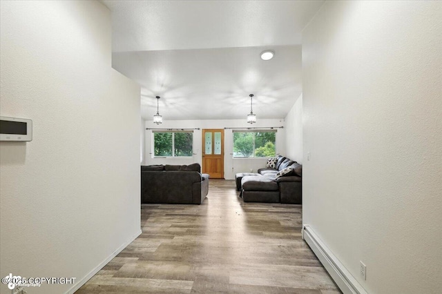 1447 N Ranch Rd, Palmer, AK 99645 - hallway featuring wood finished floors and baseboard heating