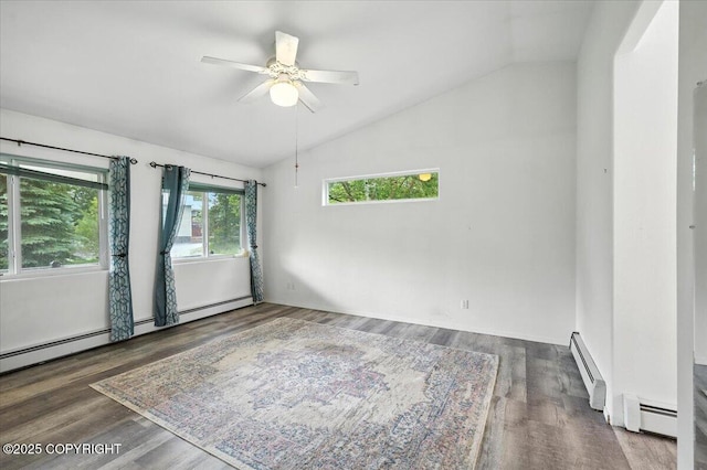 1447 N Ranch Rd, Palmer, AK 99645 - empty room featuring lofted ceiling, a baseboard radiator, ceiling fan, and wood finished floors