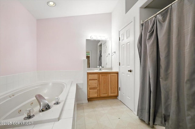 1447 N Ranch Rd, Palmer, AK 99645 - bathroom with a whirlpool tub, vanity, a shower with curtain, and recessed lighting