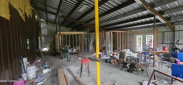 2514 E Sleepy Hollow Cir, Wasilla, AK 99654 - misc room with metal wall and concrete floors