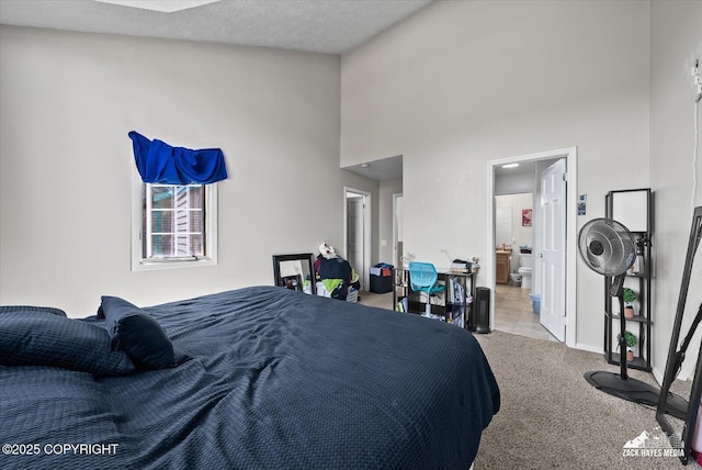 5320 Larkspur St, Anchorage, AK 99507 - carpeted bedroom featuring a high ceiling and ensuite bathroom