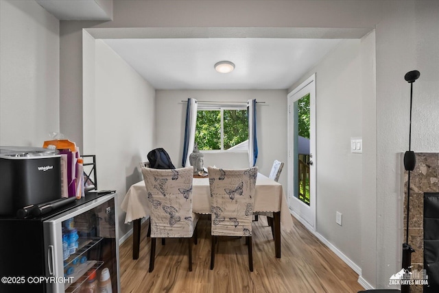 5320 Larkspur St, Anchorage, AK 99507 - dining space featuring wood finished floors and baseboards